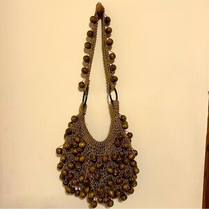 Beaded Crochet Purse with heavy wooden bead details.